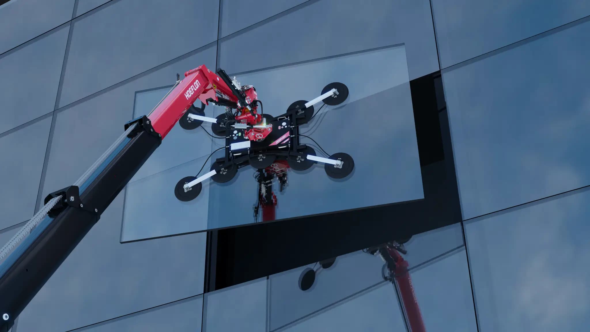 Hoeflon crane with glass suction device placing glass on a building.