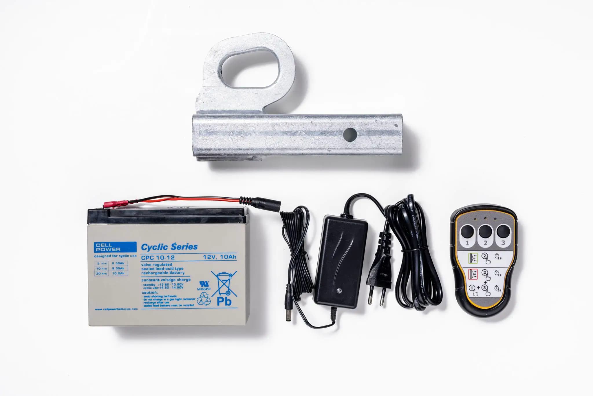 Accessories for Hoeflon C600: battery, cables, charger, and remote control.