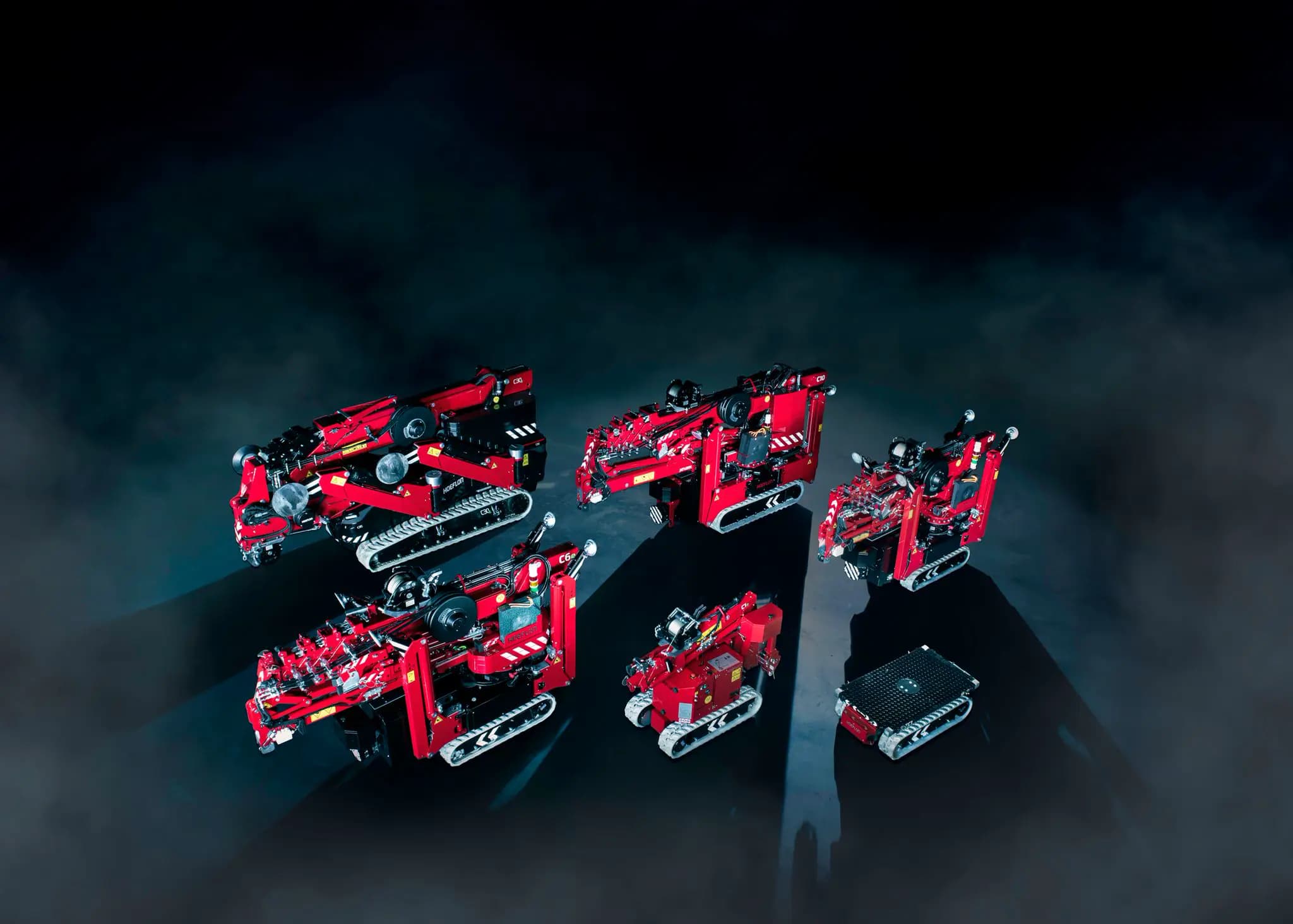 Hoeflon compact cranes and a carrie