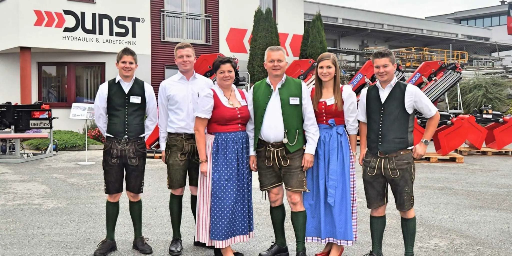 Dunst team members in traditional attire.